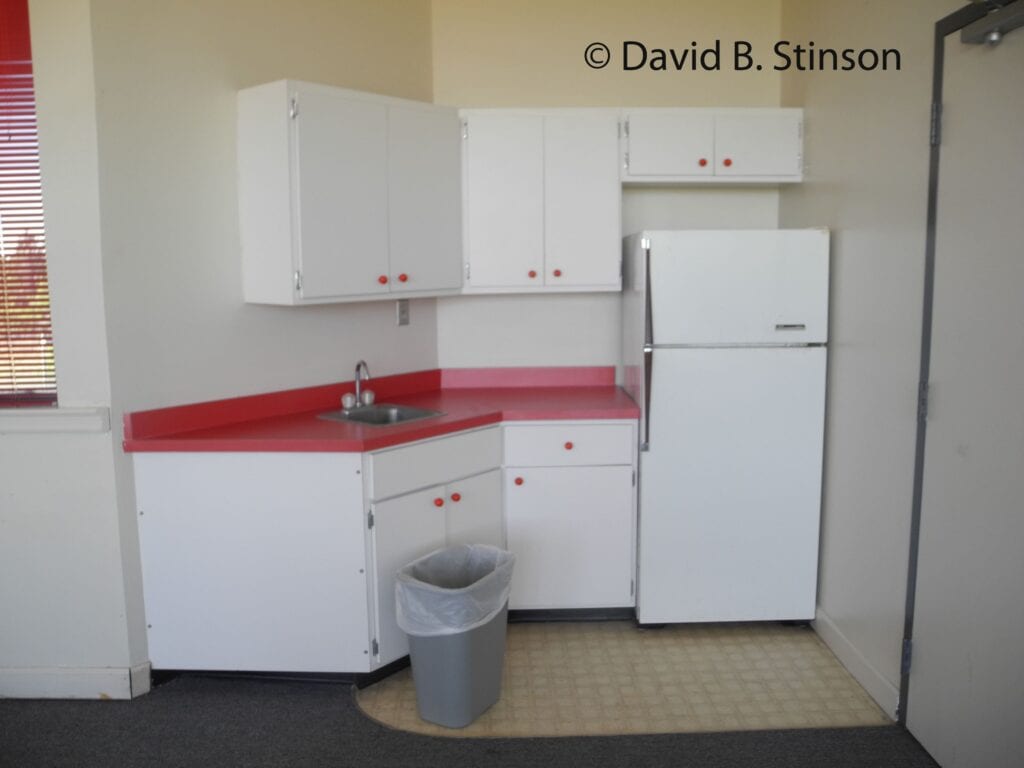 A kitchen with Cincinnati Reds colors at Plant City Stadium