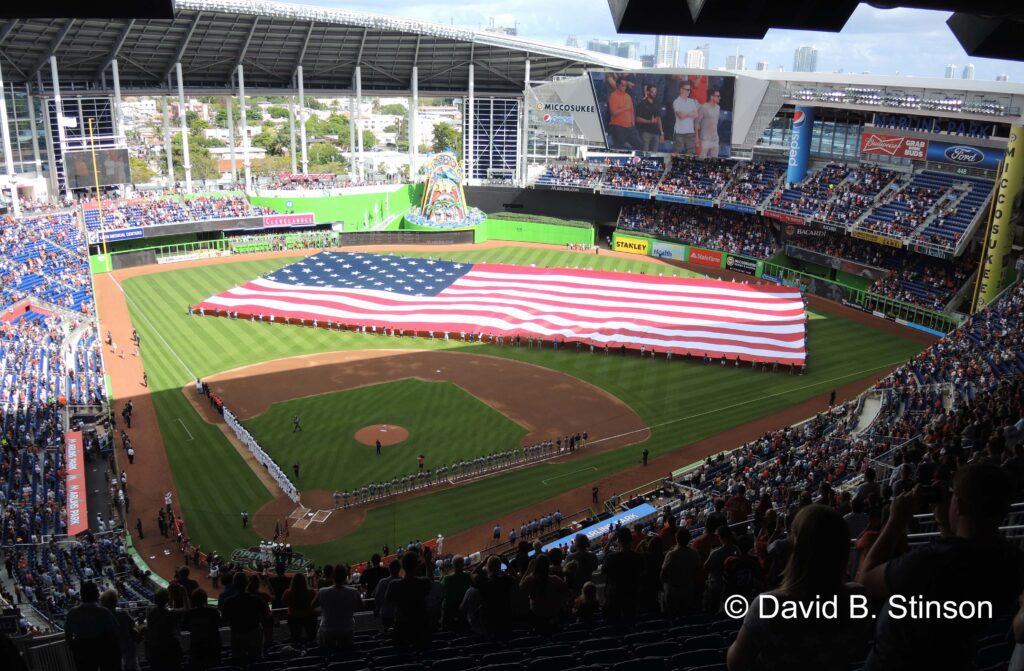 The US flag spread throughout the field