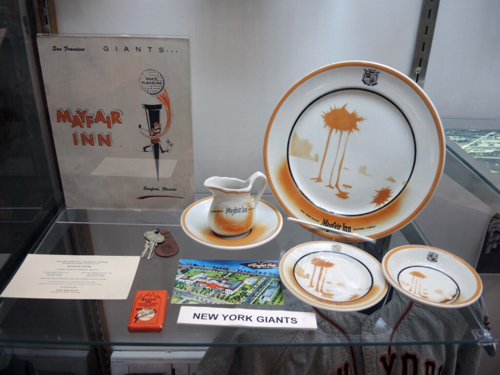 A display showing Mayfair Inn items