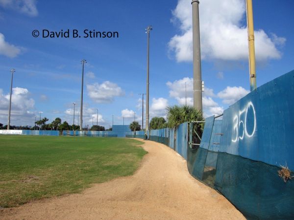 The blue right field wall of the Municipal Stadium