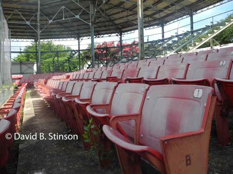 Rows of red third base box seats