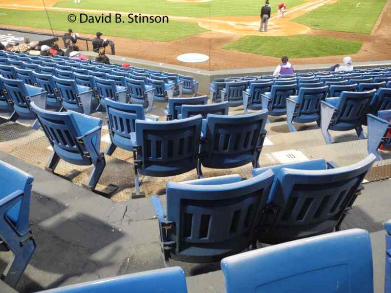 A zig-zag of seats behind home plate