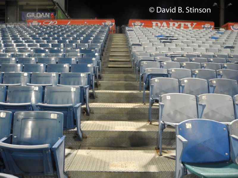 Rows of blue seats at Greer Stadium