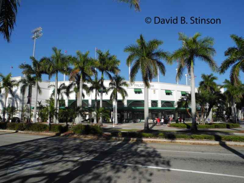 Trees and pathways in front of the City of Palms Park building