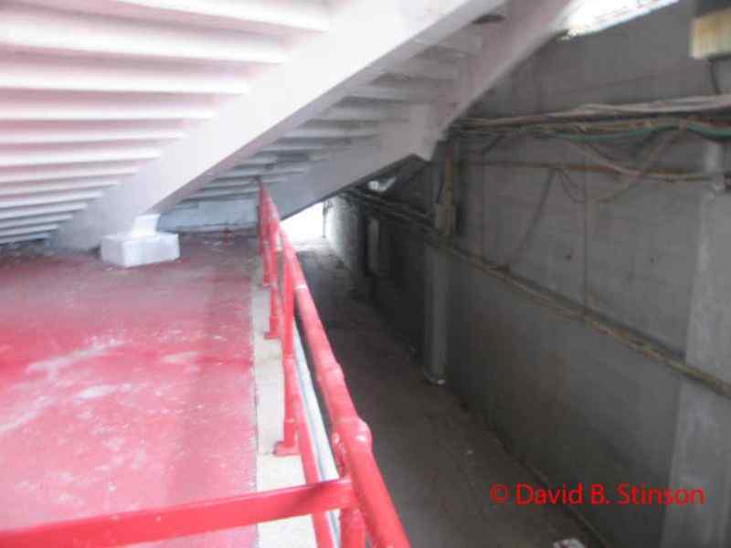 A walkway from the offices underneath the stands