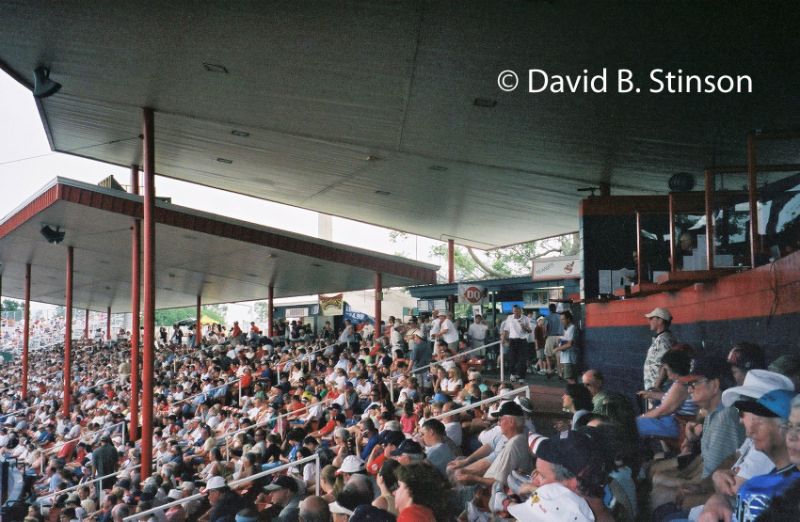 The first base grandstand seats packed with people